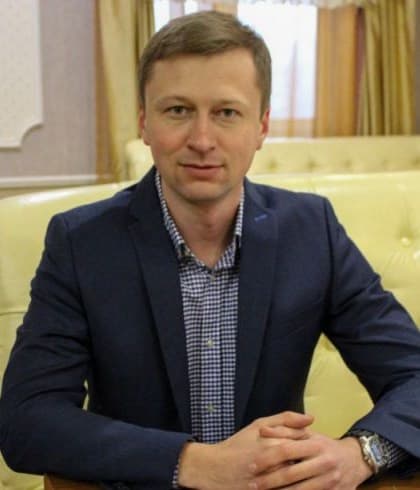 Vadym Ratynskyi, founder of Ukrainian Homecoming — a man in his forties in a dark jacket, seated, looking at the camera